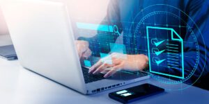 a person typing on a laptop