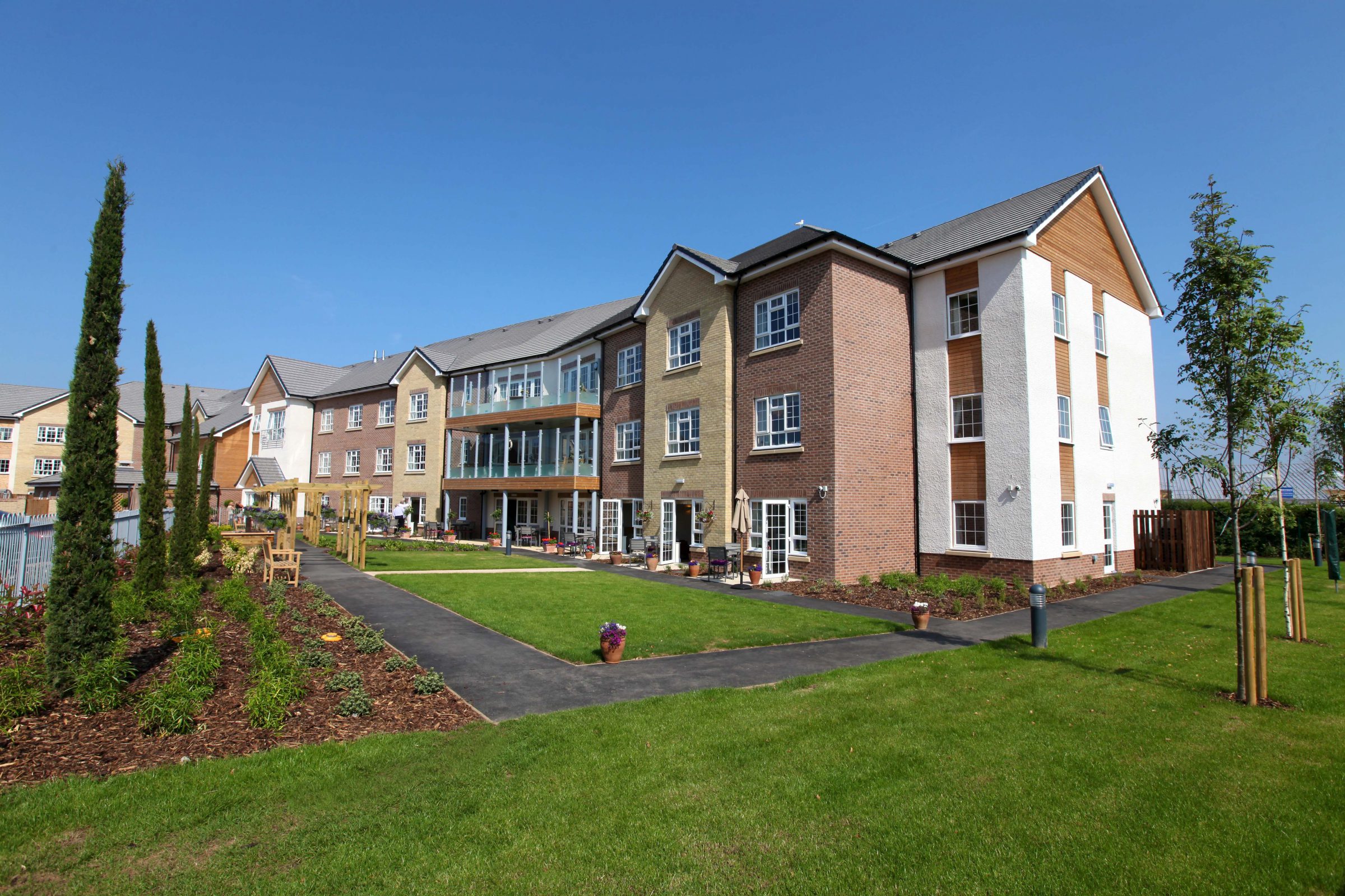 Modern residential housing development with lawn